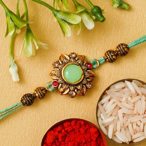 Floral Green Golden Flower Designer Rakhi for Brother, Bhaiya, Bhai with Roli Chawal Pack (eCraftIndia)