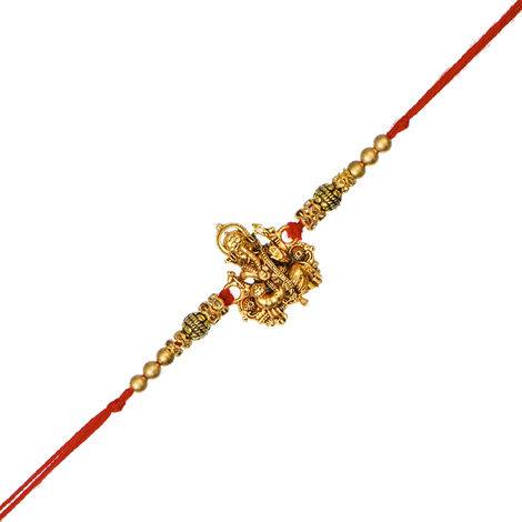 Religious Golden Designer Ganesha Rakhi for Brother with Red Thread, & Roli Chawal Pack (eCraftIndia)