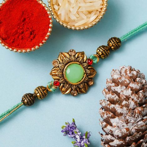 Floral Green Golden Flower Designer Rakhi for Brother, Bhaiya, Bhai with Roli Chawal Pack (eCraftIndia)