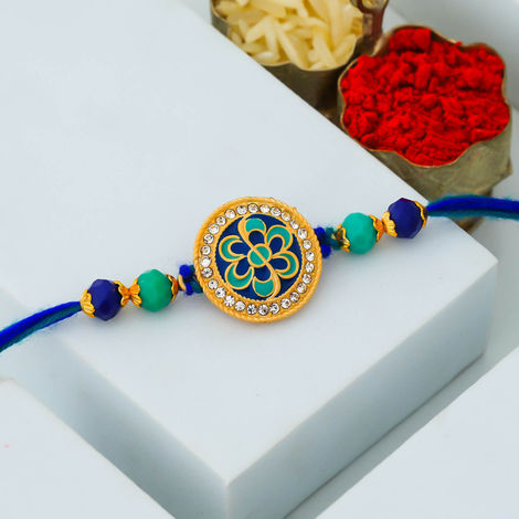 Floral Flower Designer Rakhi for Bhaiya, Bhai, Bhabhi and Kids with Roli Chawal Pack (eCraftIndia)