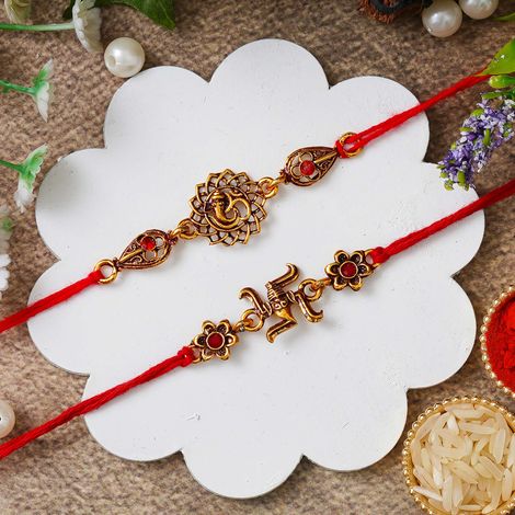 Religious Lord Ganesha, Swastika Symbol Religious Rakhis for Brothers & Roli Chawal Pack (eCraftIndia) Set of 2