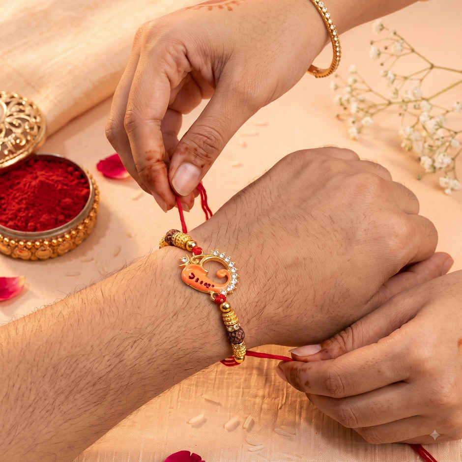 Rakhi for Brother | Ganesha Designer | Religious | Includes Roli Chawal | Pack of 1 | Tied Ribbons