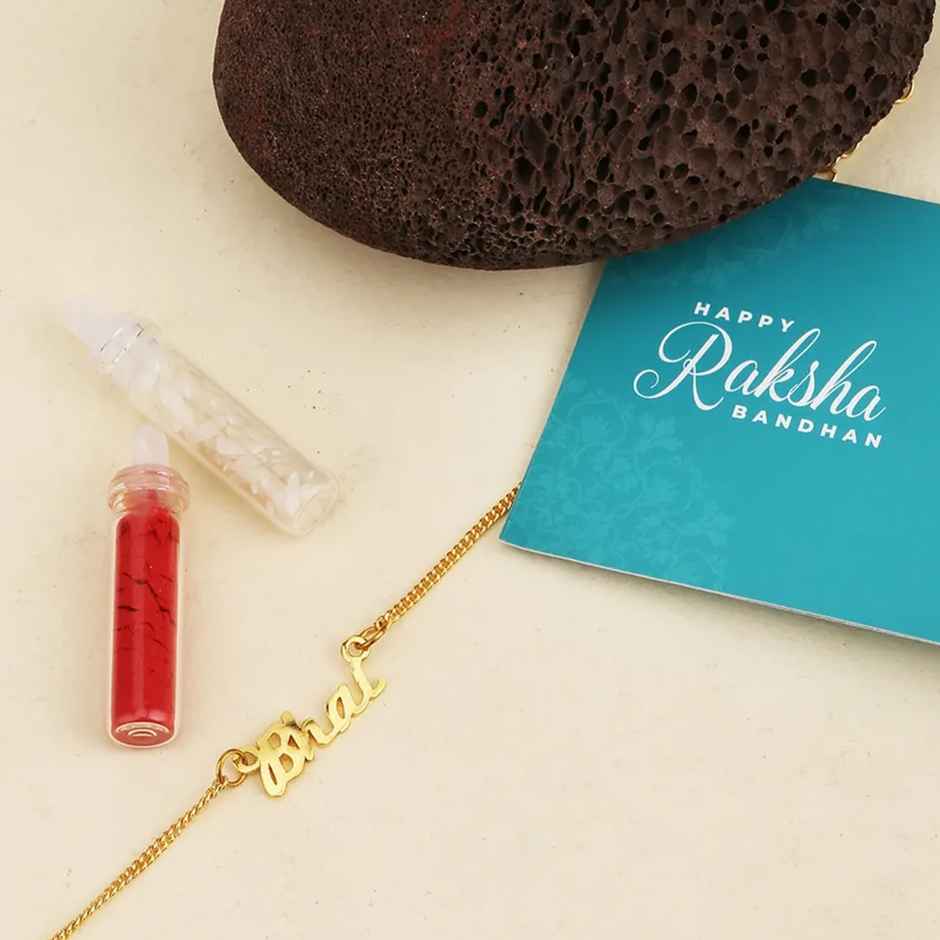 Gold-Toned Rakhi Bracelet Engraved with The Word 'Bhai' with Roli Chaawal Pack (Voylla)