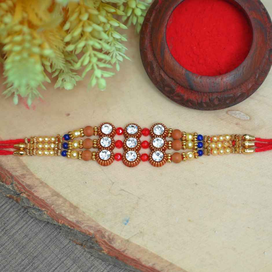 Cadbury Chocobakes Choclayered Cakes(114gms) & Aurum Premium Big Rakhi With Diamond & Bead Bracelet(1pc) Combo