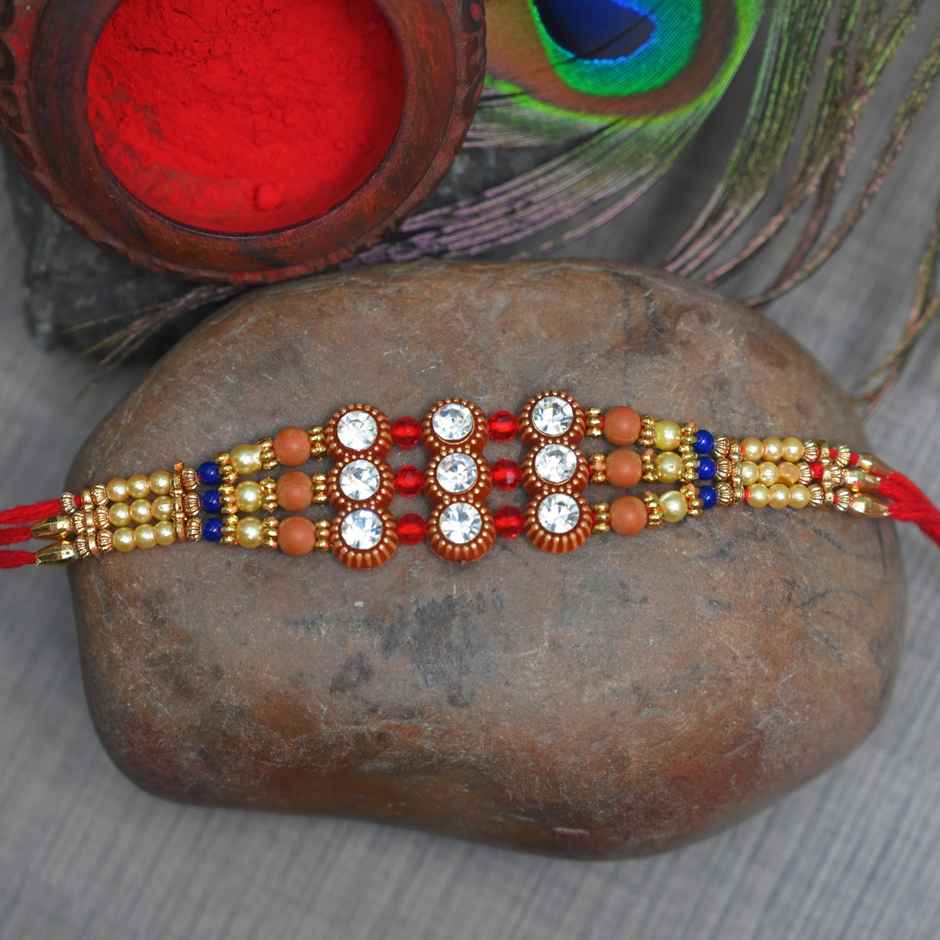 Cadbury Chocobakes Choclayered Cakes(114gms) & Aurum Premium Big Rakhi With Diamond & Bead Bracelet(1pc) Combo