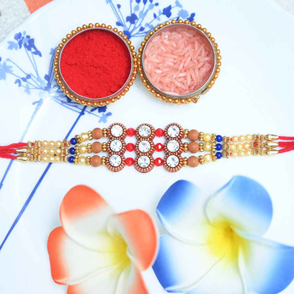 Cadbury Chocobakes Choclayered Cakes(114gms) & Aurum Premium Big Rakhi With Diamond & Bead Bracelet(1pc) Combo