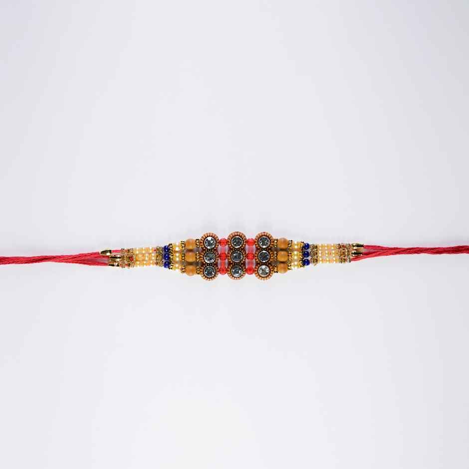 Cadbury Chocobakes Choclayered Cakes(114gms) & Aurum Premium Big Rakhi With Diamond & Bead Bracelet(1pc) Combo