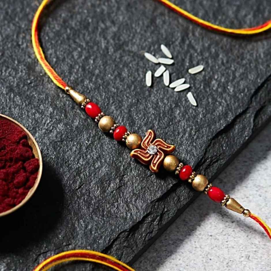 House Of Festivals Mauli Rakhi with Swastik Centrepc - Traditional and Sacred