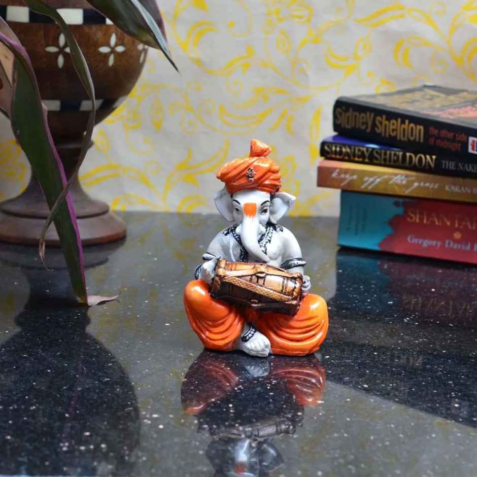 eCraftIndia Exquisite Handcrafted Polyresin Musician Lord Ganesha Idol Playing Dholak
