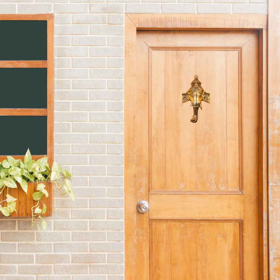 Ganesh With Trunk in Gold Polish Wall Hanging for Main Door | Devnidhi