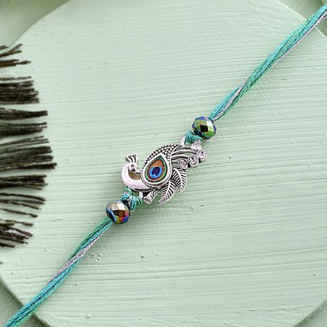 Thread Lord Krishna Motifs Divine Thread Rakhi For Brother (Voylla)