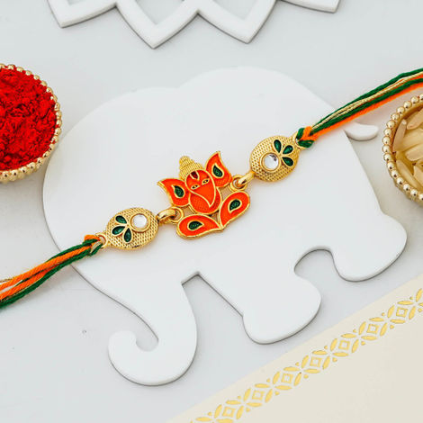 Religious Orange Lord Ganesha Raksha Bandhan Rakhi for Bhai Bhaiya Kids | Roli Chawal Pack (eCraftIndia)