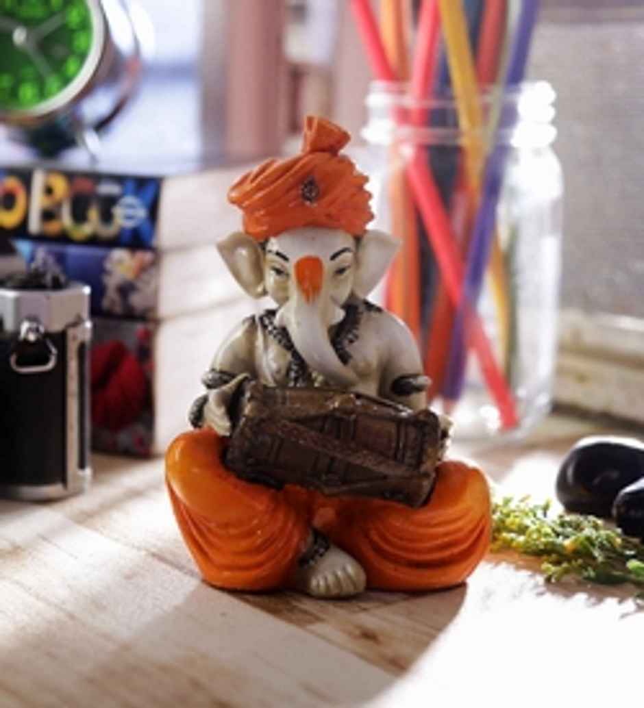 Exquisite Handcrafted Polyresin Musician Lord Ganesha Idol Playing Dholak | Ecraftindia