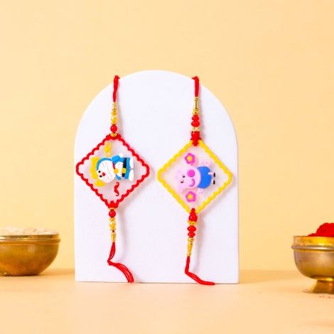 Kids Doraemon and Peepa Pig Rakhi with Roli Chawal (Tied Ribbons) Pack of 2