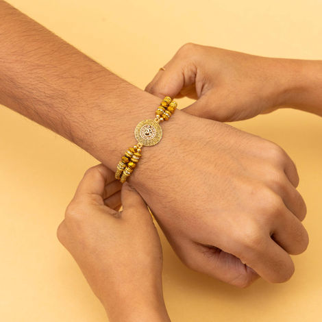 Religious OM and Ganesha Rakhi for Brother with Roli Chawal (Tied Ribbons) Pack of 2