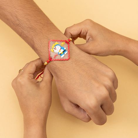 Kids Doraemon and Peepa Pig Rakhi with Roli Chawal (Tied Ribbons) Pack of 2