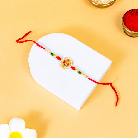 Religious Ganapati Rakhi with Intricate Meenakari Work (BANDHAN)