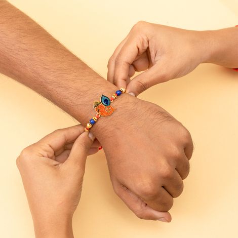 Religious Ganesha With Moor Pankh Rakhi Curated To Bless Brothers (BANDHAN)
