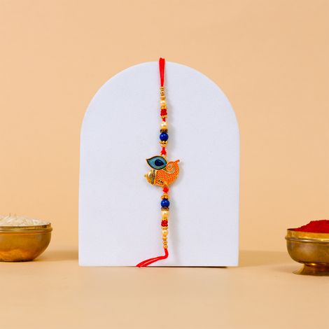 Religious Ganesha With Moor Pankh Rakhi Curated To Bless Brothers (BANDHAN)