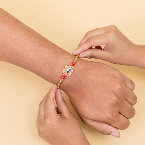 Evil Eye In A Flower Design Rakhi With Meenakari Work For Brother (BANDHAN)