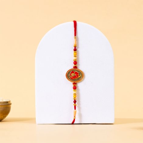 Religious Ganesha Sindoori Orange Meenakari Rakhi (BANDHAN)