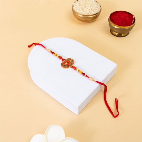 Religious Ganesha Sindoori Orange Meenakari Rakhi (BANDHAN)