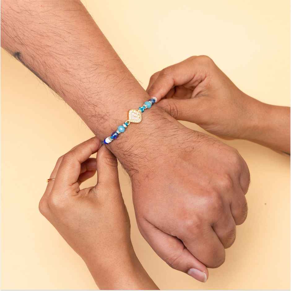 American Diamond Premium A.D. Swastik Rakhi (Avyaan Rakhi) Set of 1