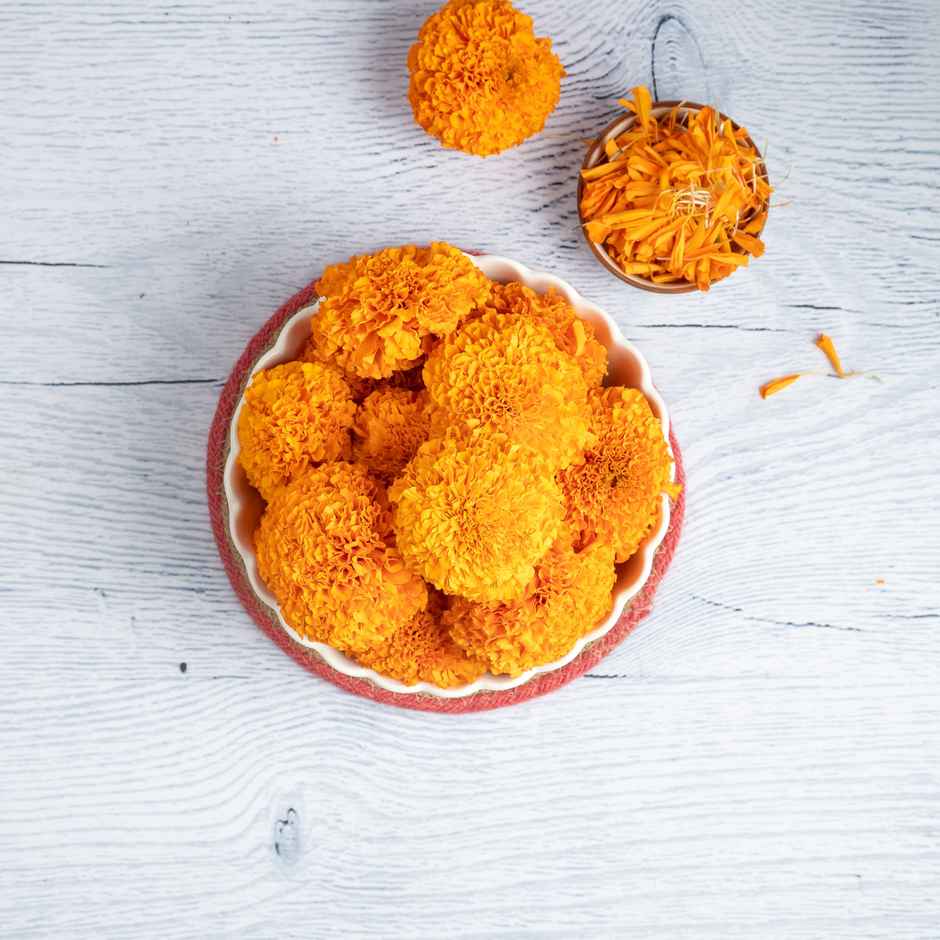 Belpatra(50gms), Marigold Yellow Flower(100gms) & Betel Leaves (Pan)(5pc) Combo