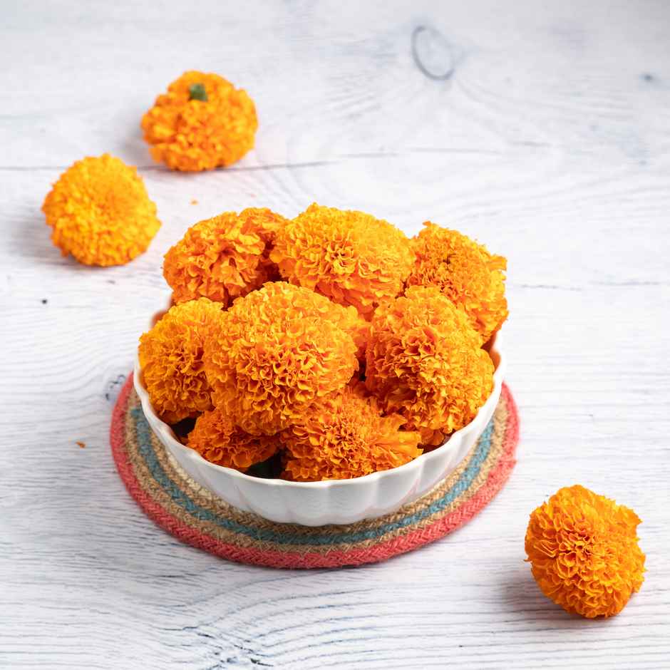 Belpatra(50gms), Marigold Yellow Flower(100gms) & Betel Leaves (Pan)(5pc) Combo