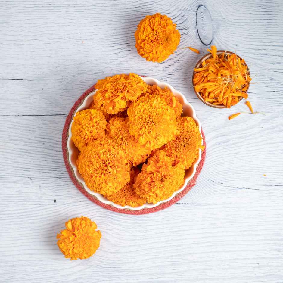 Belpatra(50gms), Marigold Yellow Flower(100gms) & Betel Leaves (Pan)(5pc) Combo