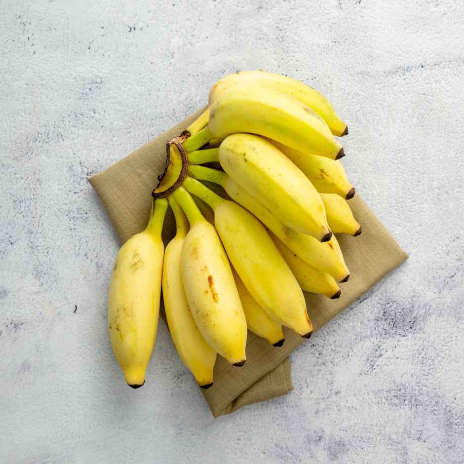 Coconut (1pc) & Banana Elaichi / Yelakki (500g) & Marigold Yellow Flower (100g) Combo