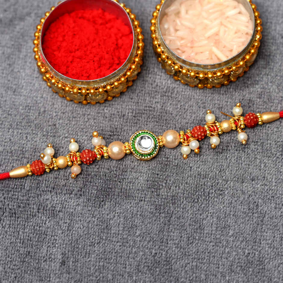 Aurum Pearl Rakhi With Rudhraksh & Ghugharu - Elegant Rakhi