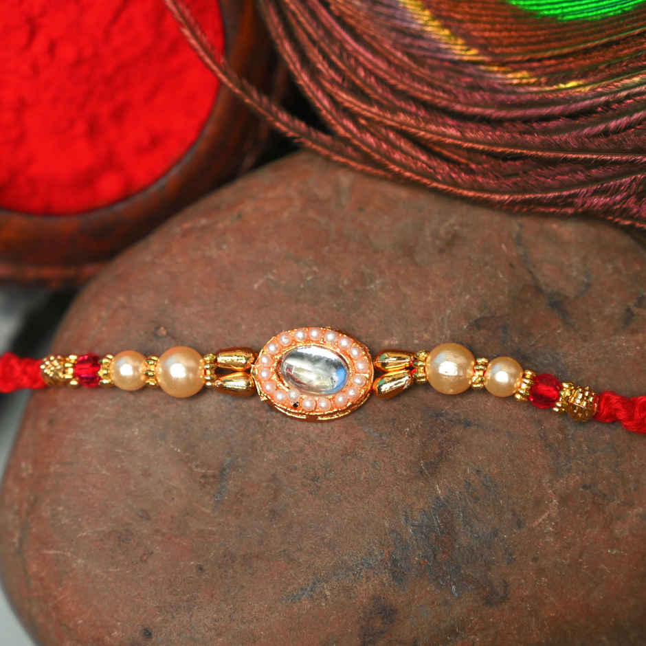 Aurum Oval Shape Pendant Rakhi - Elegant Design