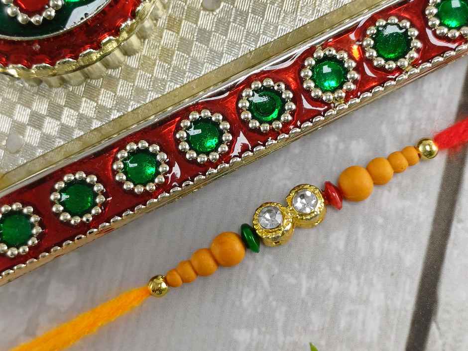 Gullak Diamante and Beaded Wood Rakhi - Elegant and Natural