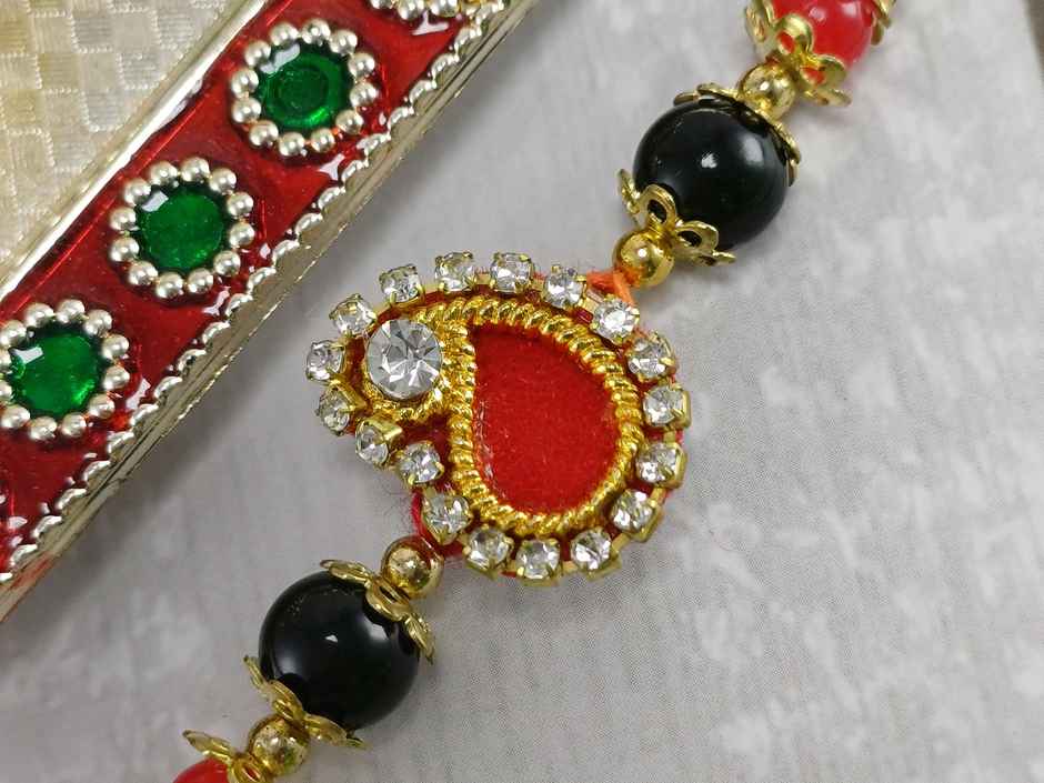 Small Red Paisley Rakhi | Chic Design | Gullak