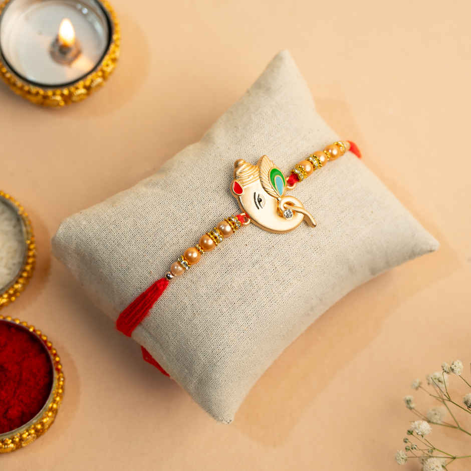 Rakhi for Brother | Ganesha Designer | Religious | Includes Roli Chawal | Pack of 1 | Tied Ribbons