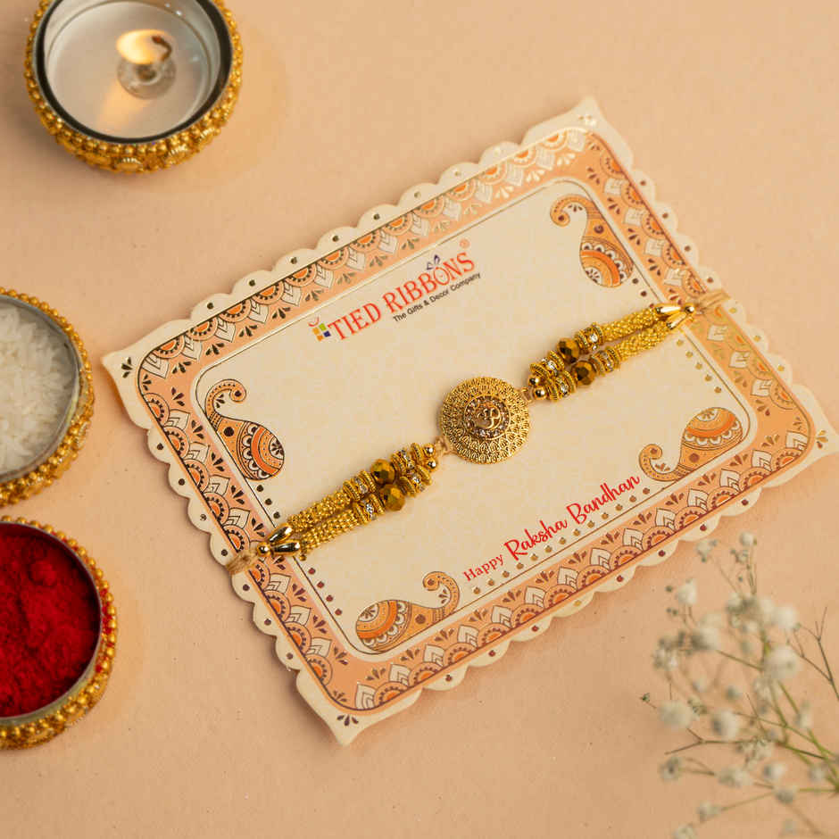 Rakhi for Brother | Om Designer | Religious | Includes Roli Chawal | Pack of 1 | Tied Ribbons