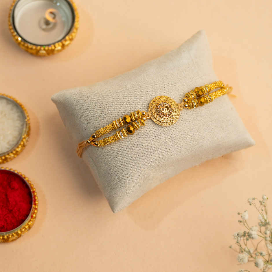 Rakhi for Brother | Om Designer | Religious | Includes Roli Chawal | Pack of 1 | Tied Ribbons