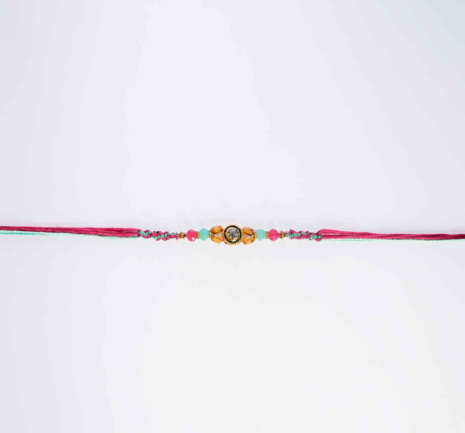 Fabelle Chocolate Home Pack Mini Delights Assorted Treats Pack(140gms) & Aurum Kundan Rakhi With Beads(1pc) Combo