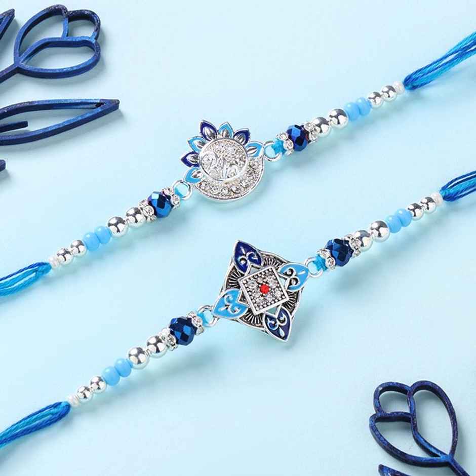 FlowerAura Fancy Blue Zircon Premium Rakhi Set Of 2