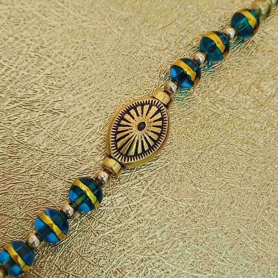 Gullak Oval Chakra Rakhi - Glass Beads