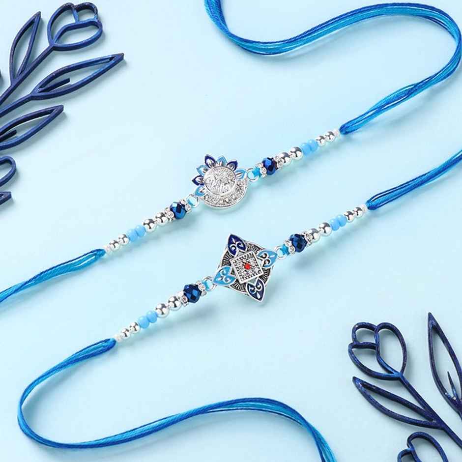 FlowerAura Fancy Blue Zircon Premium Rakhi Set Of 2