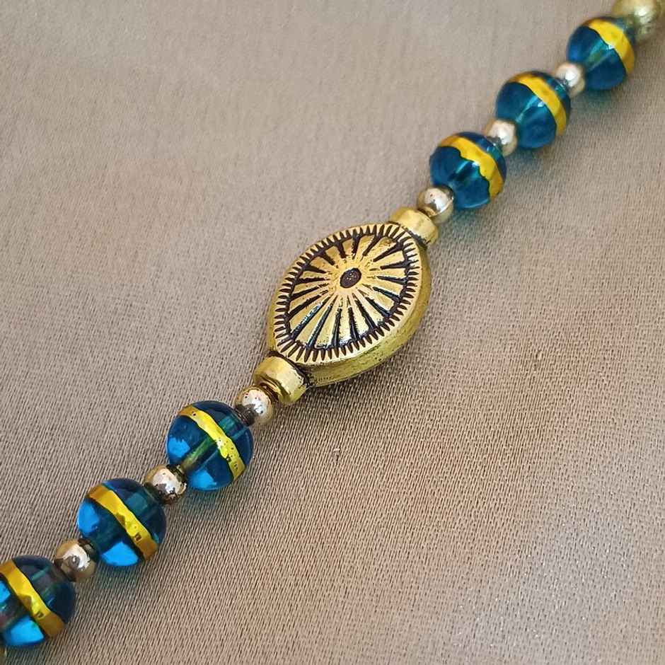 Oval Chakra Rakhi | Glass Beads | Gullak