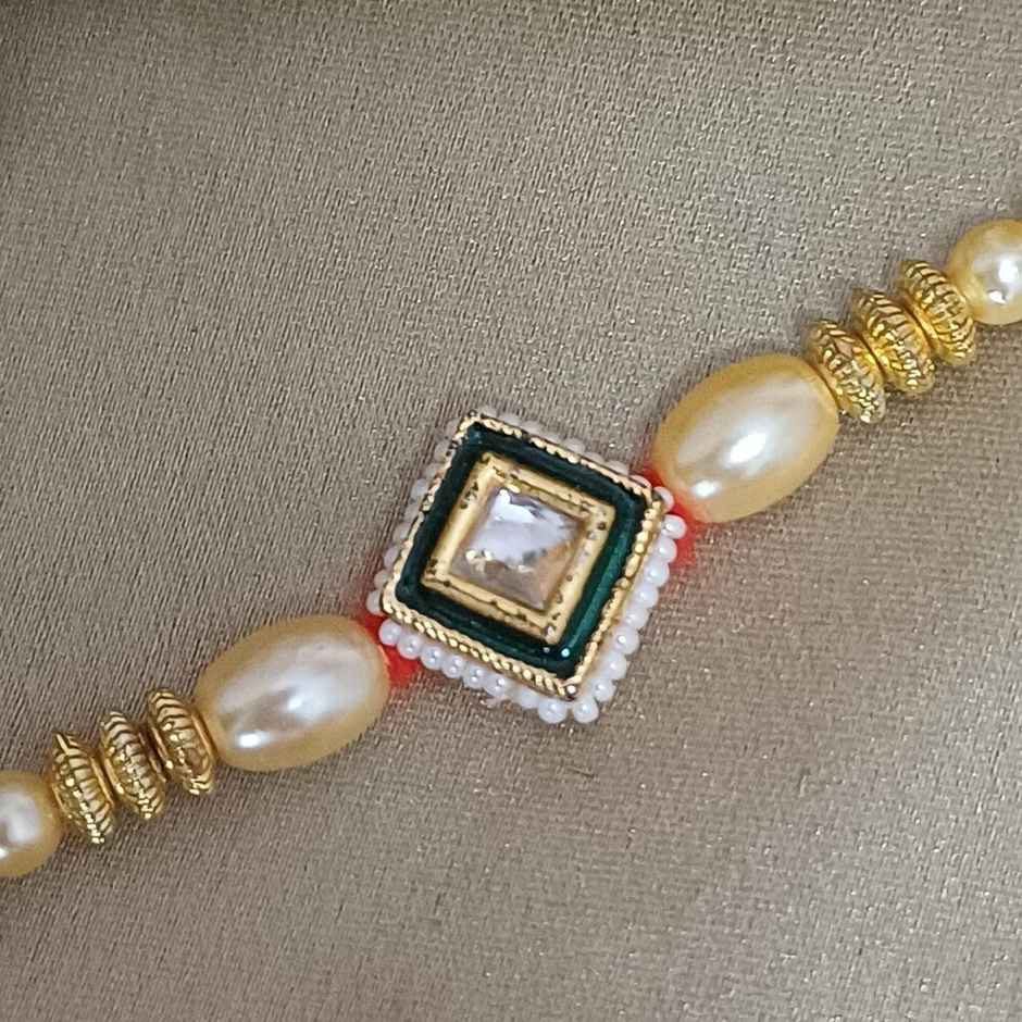 Gullak Rajasthani Square Pendant Kundan Motiwork Rakhi - Traditional and Ornate