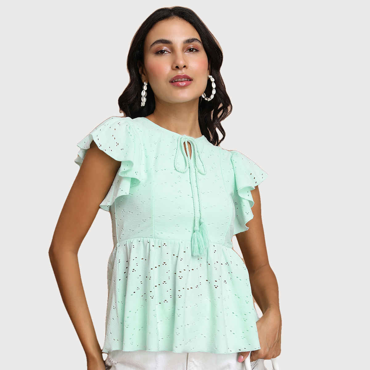 Tokyo Talkies Women's Schiffli Peplum Top with Tie-Up Neck and Flutter Sleeves | Blue - M