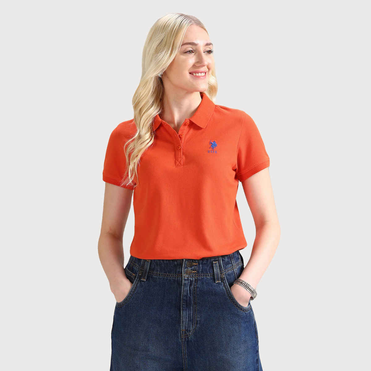 U.S. Polo Assn. Women's Embroidered Logo Solid Polo T-shirt | Orange - M