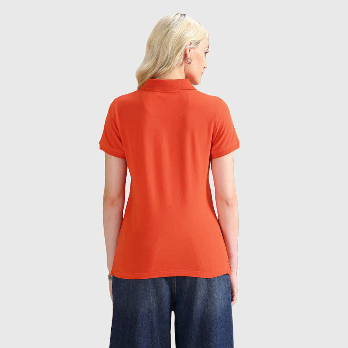 U.S. Polo Assn. Women's Embroidered Logo Solid Polo T-shirt | Orange - M