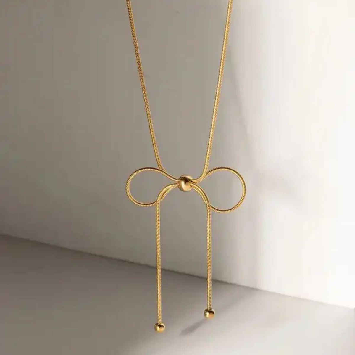Estailo Fashion At The 11th Hour Bow Neckpiece | Gold