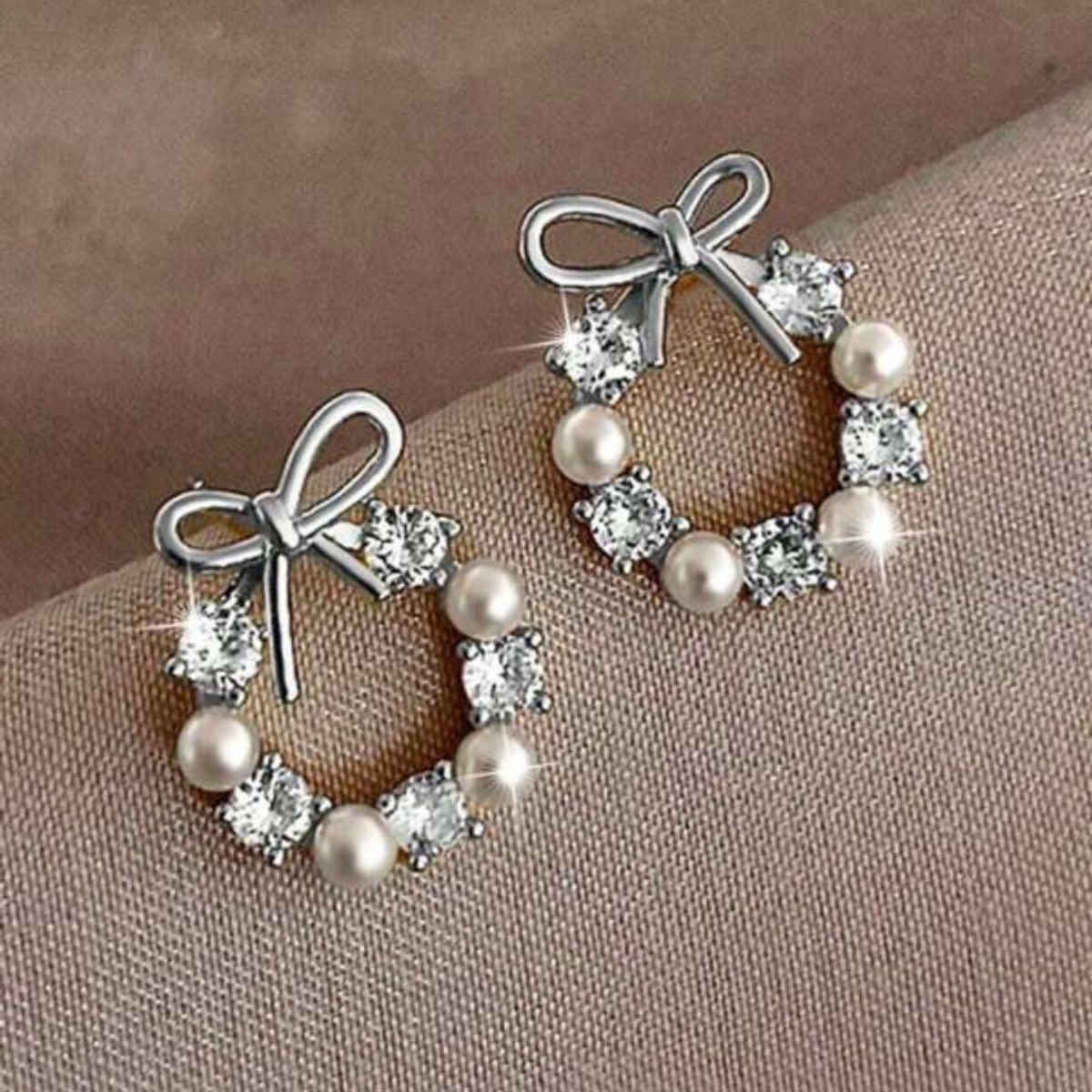 Estailo Fashion Pearl & Crystal Bow Stud Earrings