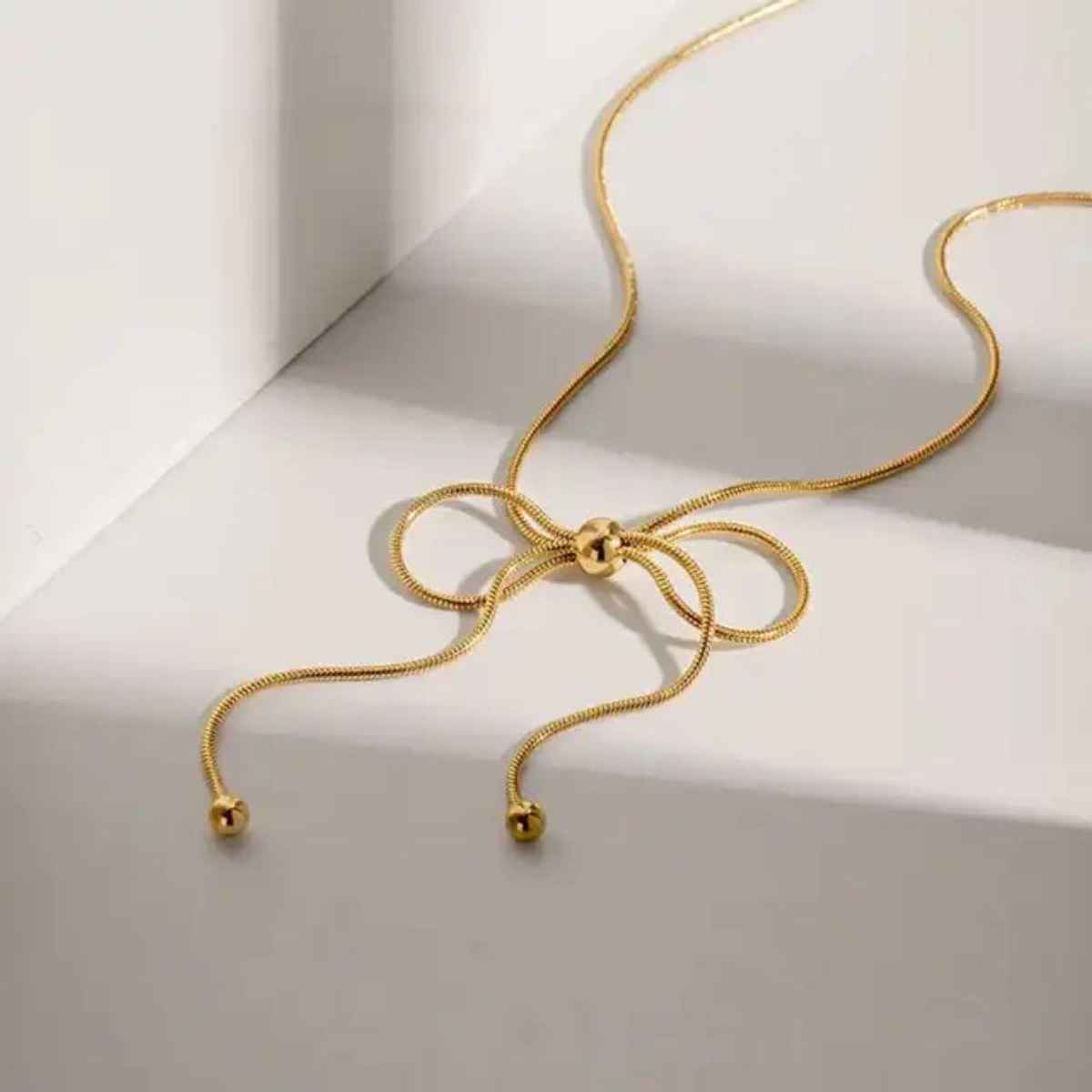 Estailo Fashion At The 11th Hour Bow Neckpiece | Gold